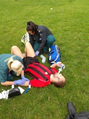 Paramedics tending to my broken leg