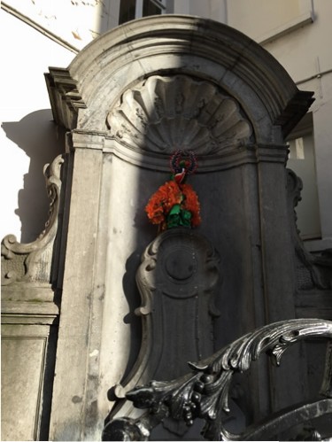 Manneken Pis all dressed up in one of his many costumes