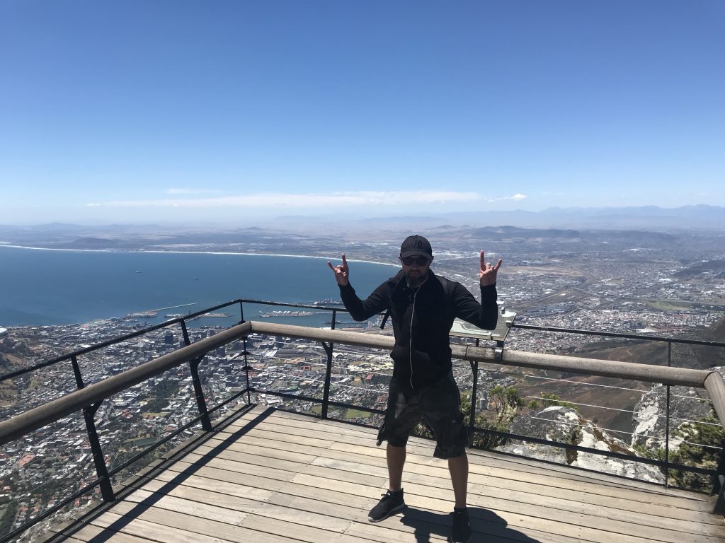 Me looking terrified as I look out on the views to Cape Town from the mountain top viewing platform.